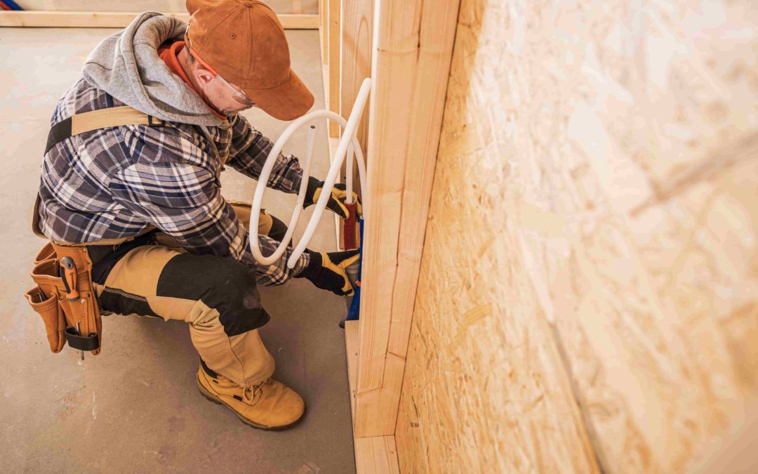 Richmond plumber installing new fiberglass pipe insulation